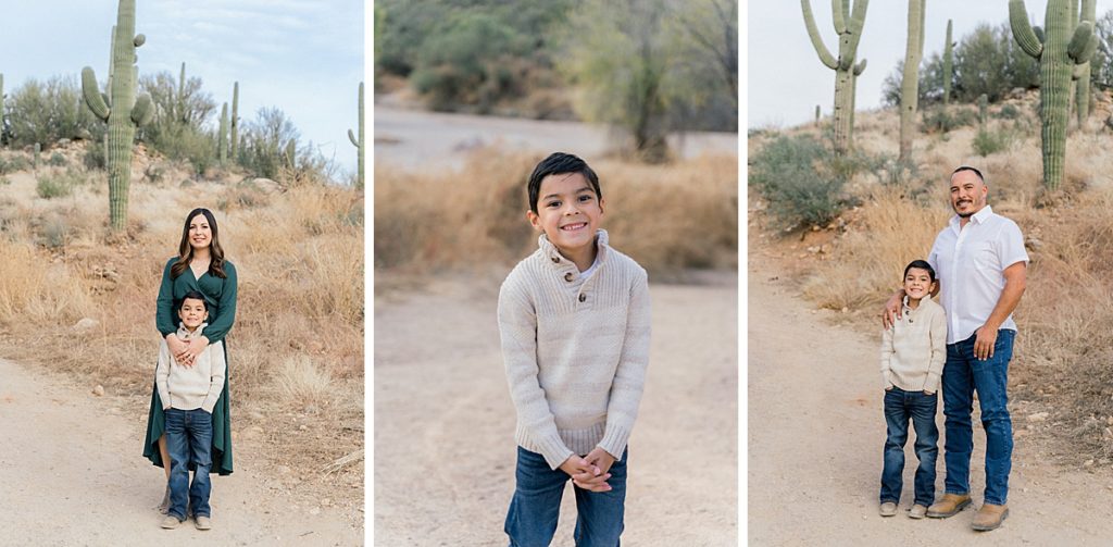 young son with mother and father in the desert at catalina state park. Green dress on mom and beige sweater on son.