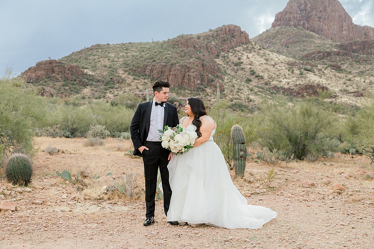 bride at groom at Stardance event center with the desert in the background