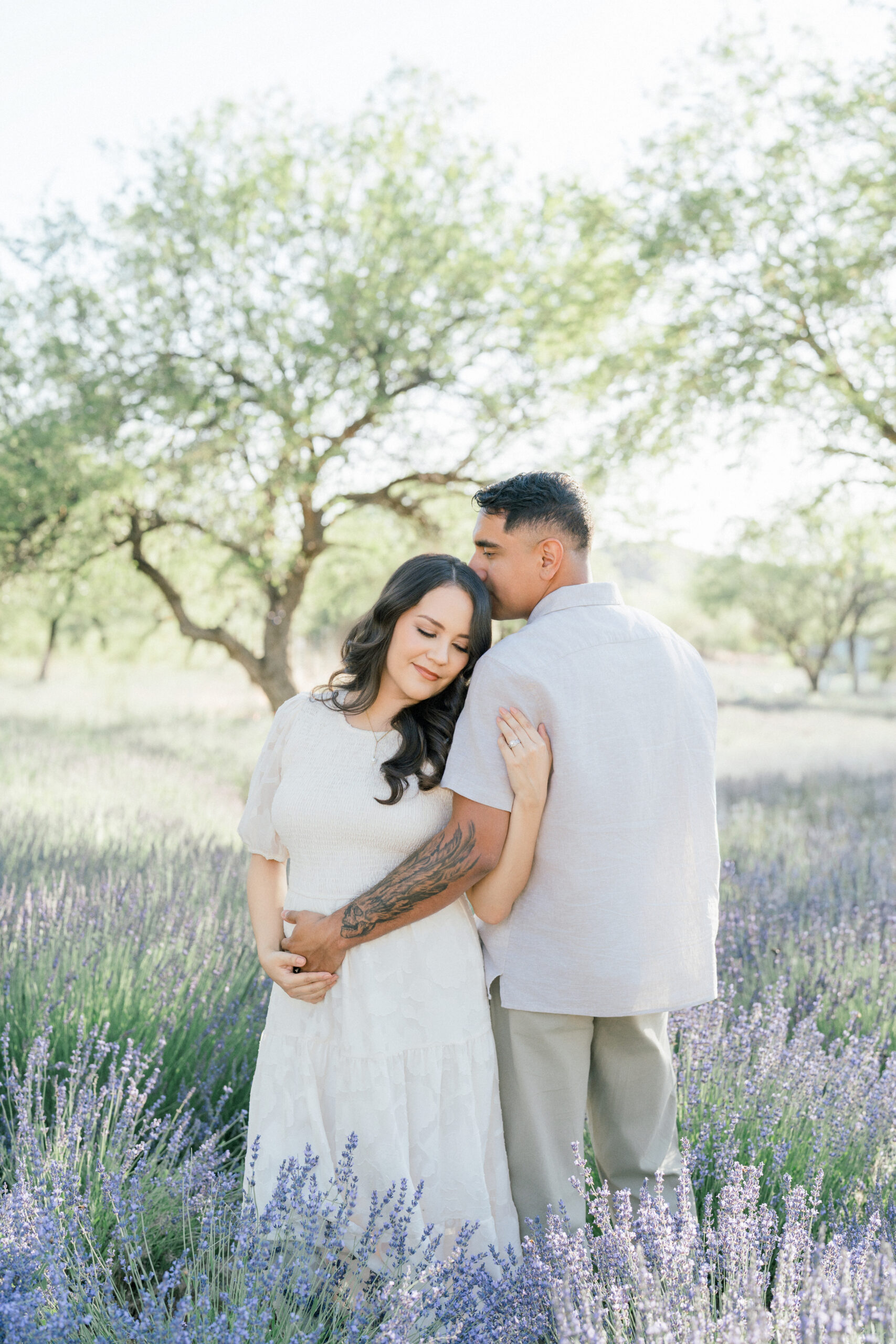 Maternity session with neutral colors at the lavender fields in Oracle, AZ.